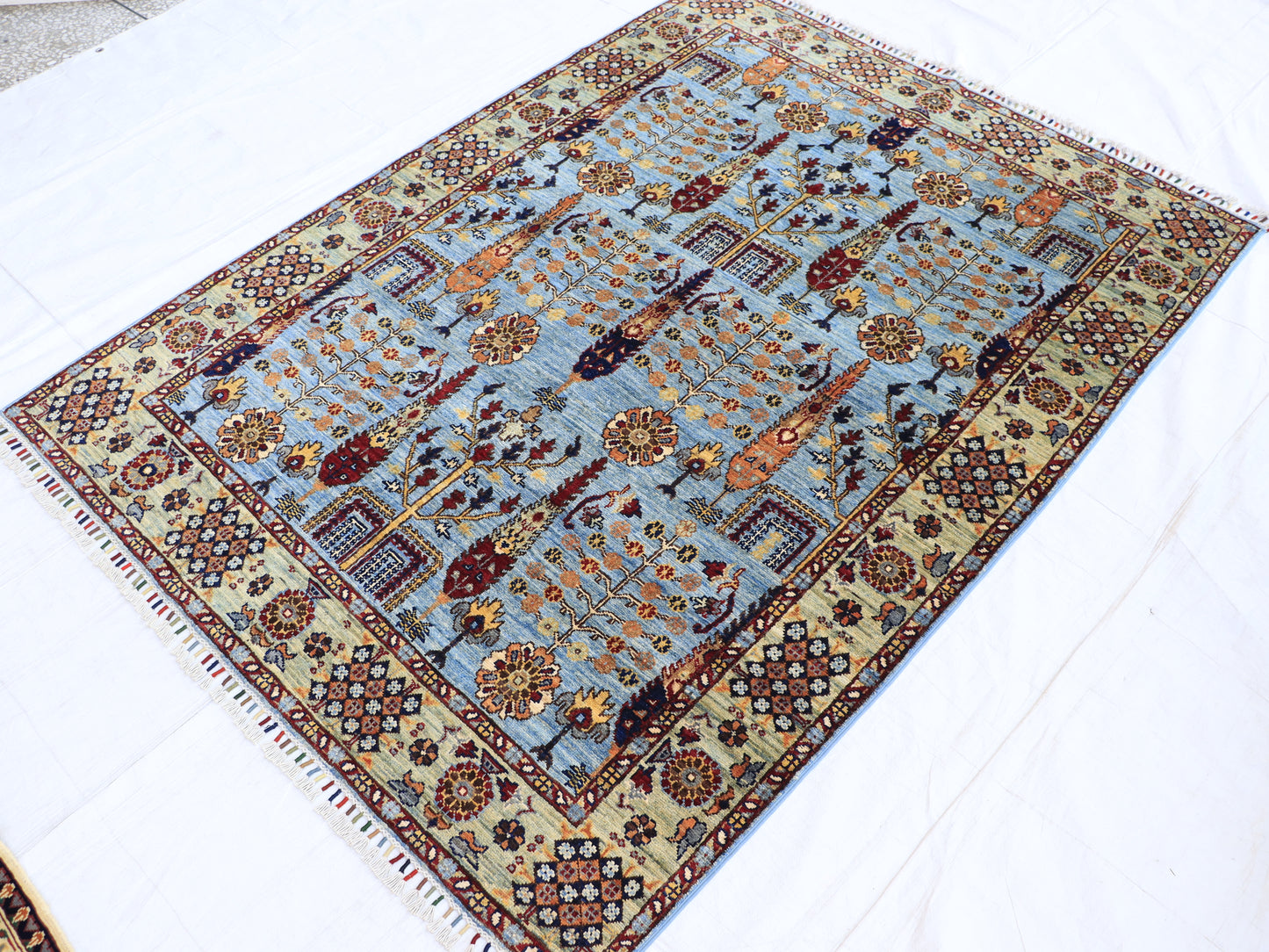 5x7 ft Blue Pictorial Area Rug